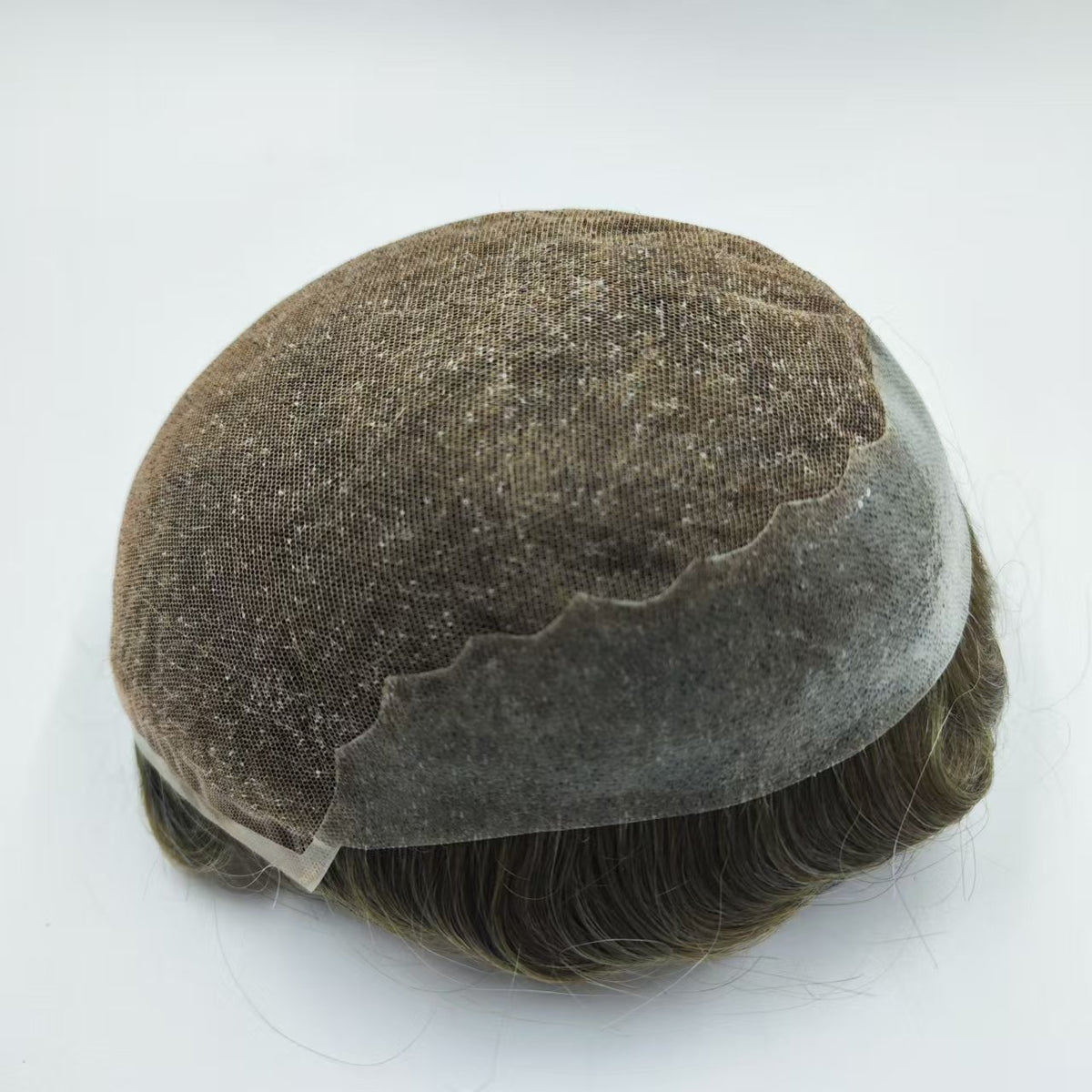 Q6 system base in ash-brown showing poly mesh crown and lace front scalloped edge