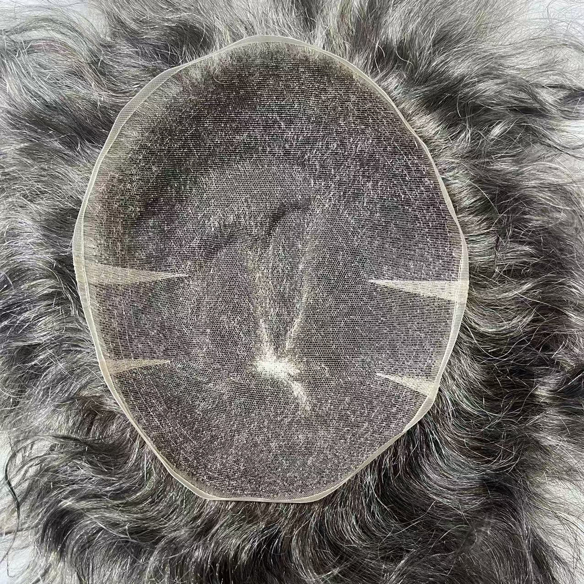 Overhead view of Full Swiss lace in silver-white showing complete base with center part