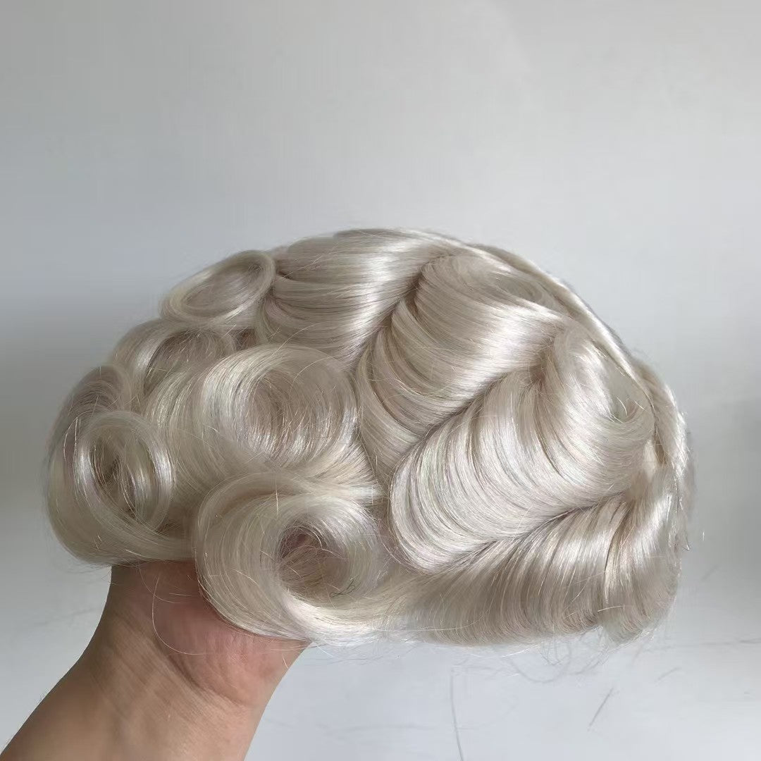 Top view of Q6 system in platinum white showing full curly pattern and light center part