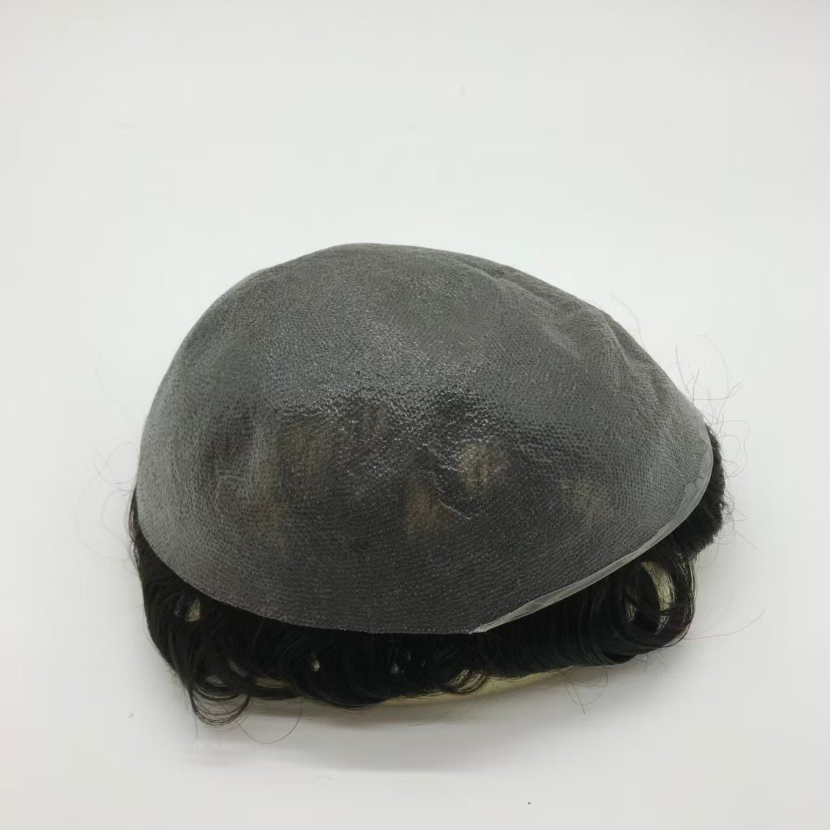 Ultra Thin poly skin base front view showing smooth 0.03mm surface blending with scalp